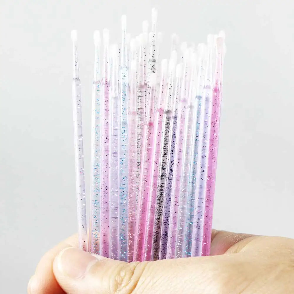 Crystal Disposable Eyelash Brushes with fine tips for precise lash extension application and safe